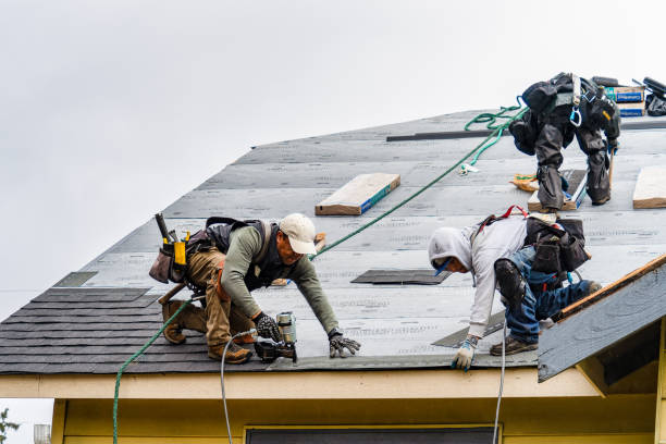 Professional Gutter Installation technician working in Ariel, WA